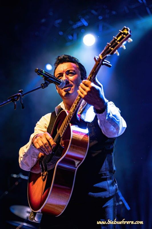 Johnny Cash Roadshow performing on stage.