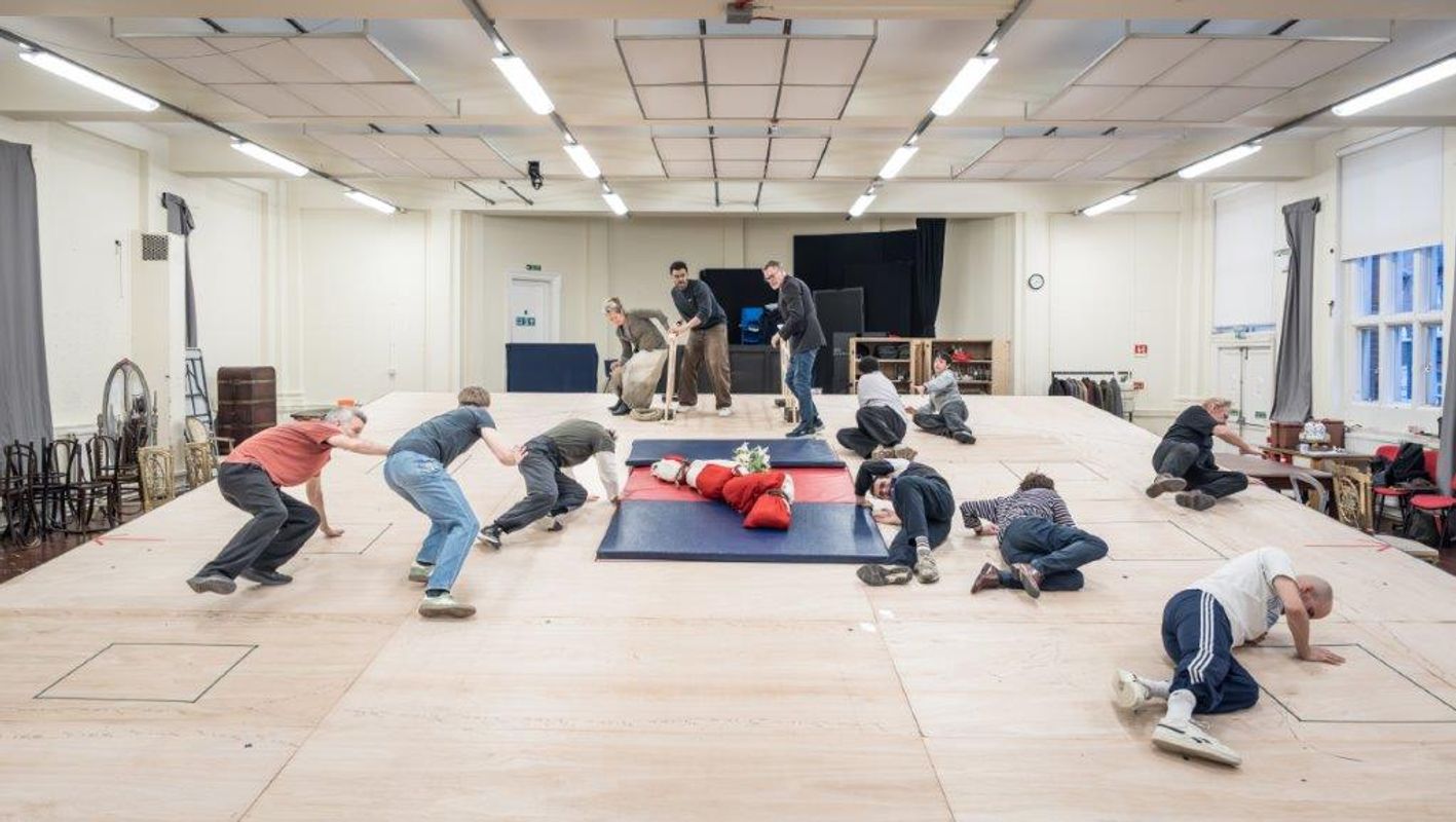 Group of people in rehearsal for Hamlet