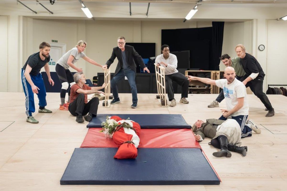 Group of people in rehearsal for Hamlet