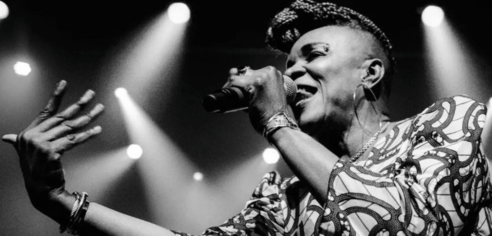 Woman singing on stage