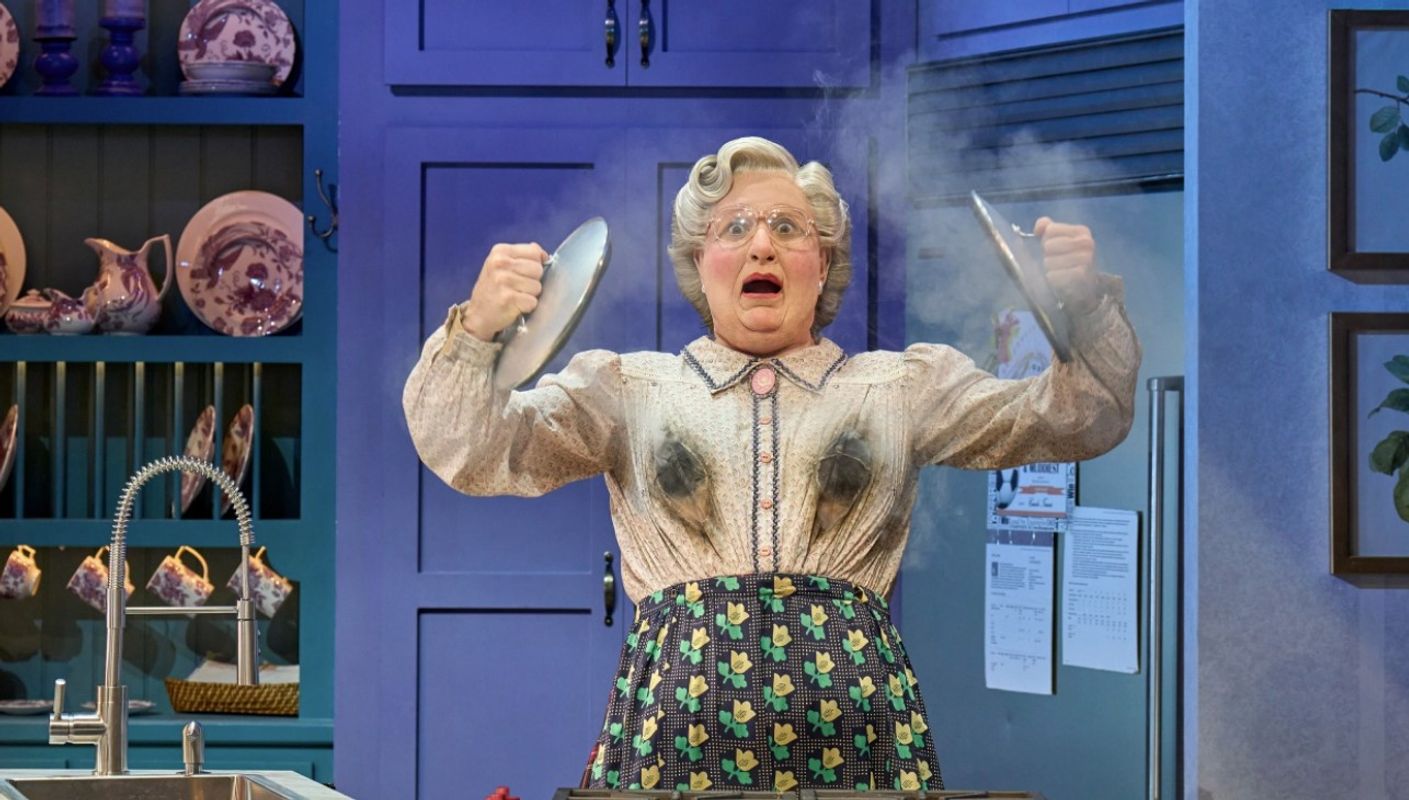 Mrs Doubtfire has got two burnt marks on the upper torso and his holding pan lids in the air