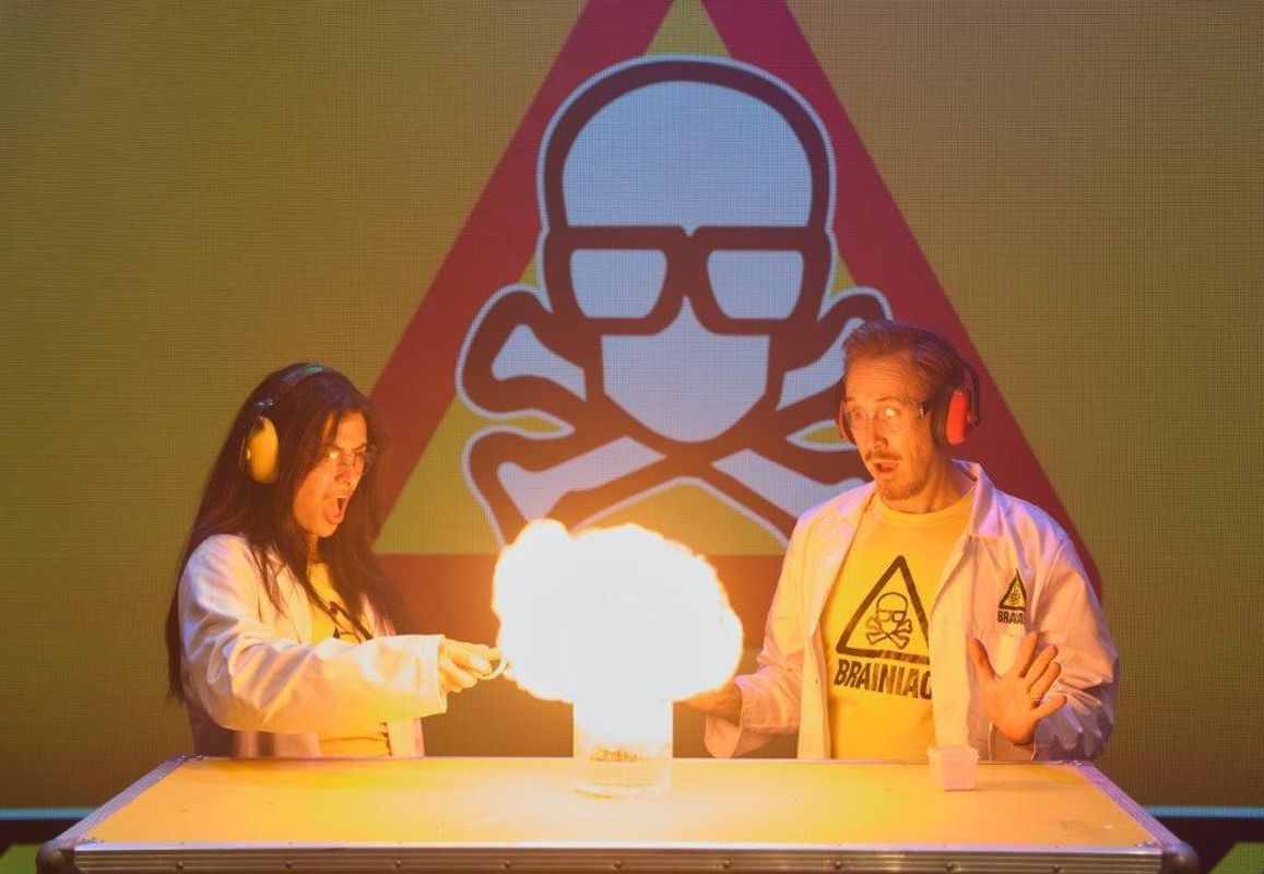Two people look over an experiment.