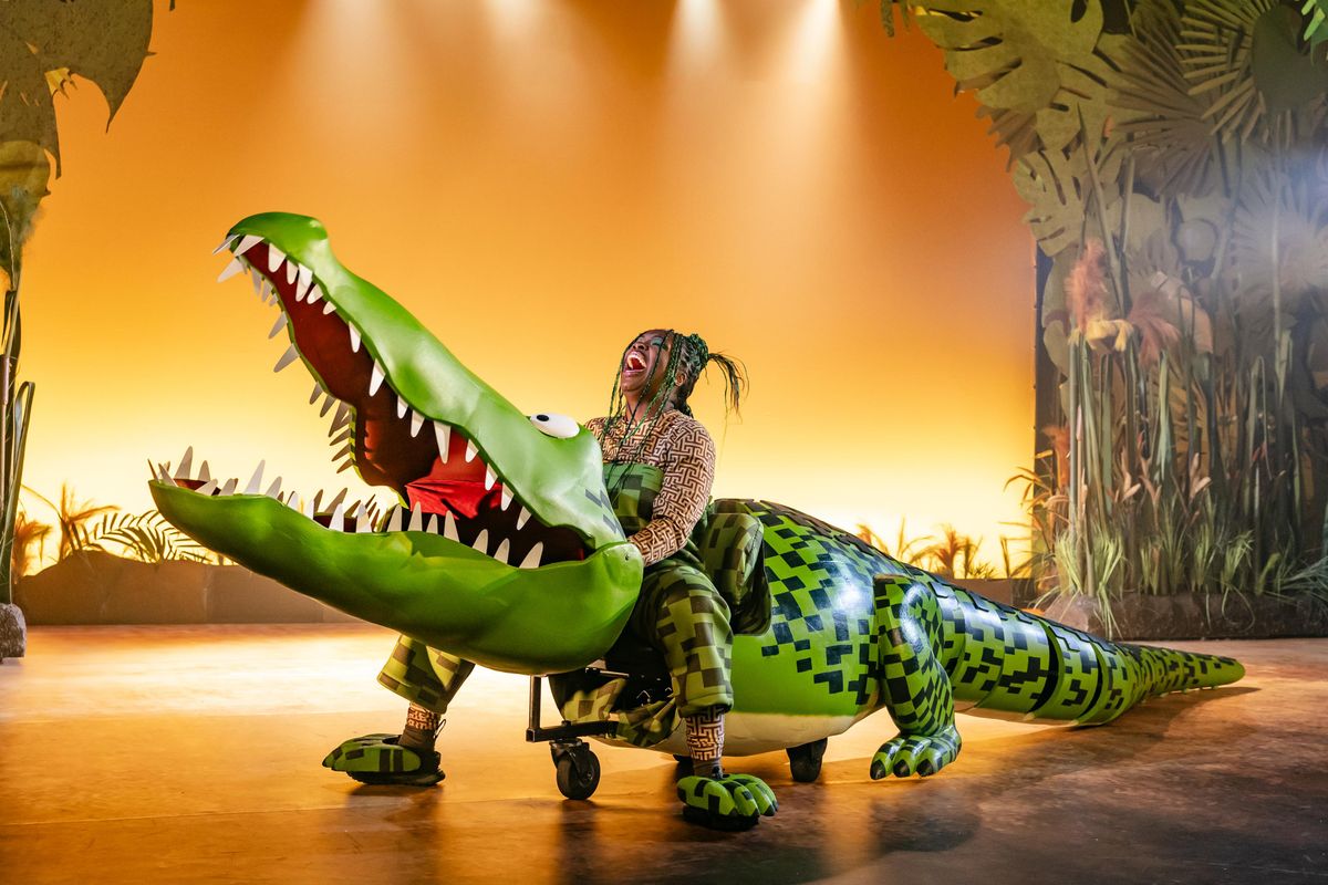 The crocodile opens it's large mouth