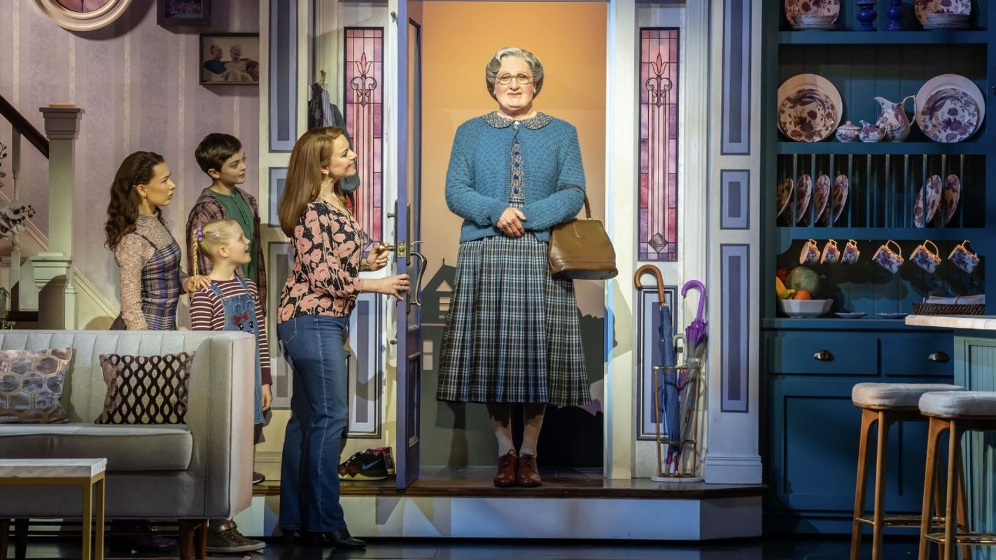 Mrs Doubtfire is being greeted at the front door by a family