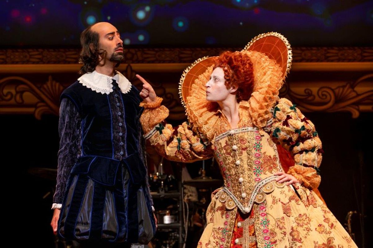 Two people dressed in tudor outfits