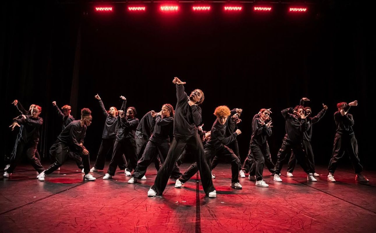 Marshdon Dance Company posing on stage