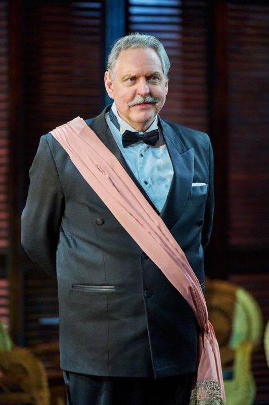 A person stood alone with their hands held behind their back