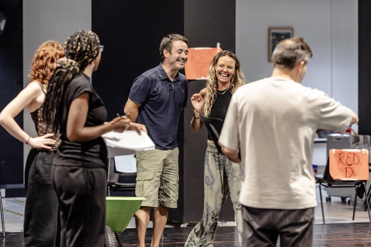 Performers rehearsing in studio space for The Curious Incident
