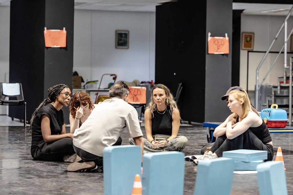 Performers rehearsing in studio space for The Curious Incident