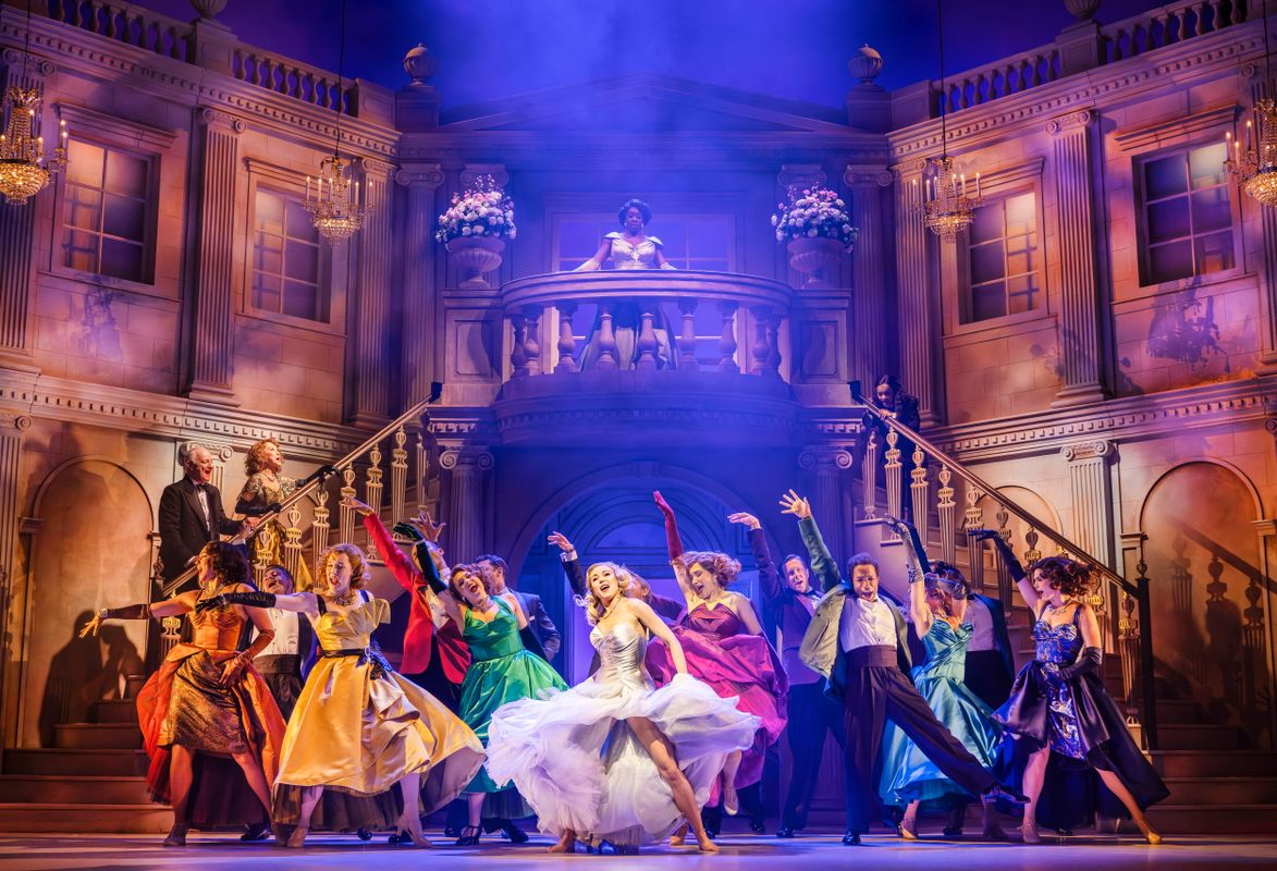 cast of High Society on stage dancing