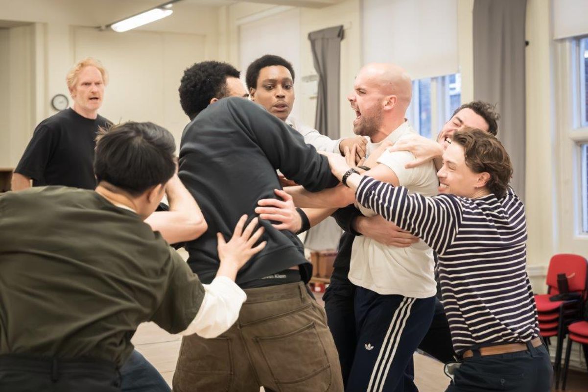 Group of people in rehearsal for Hamlet