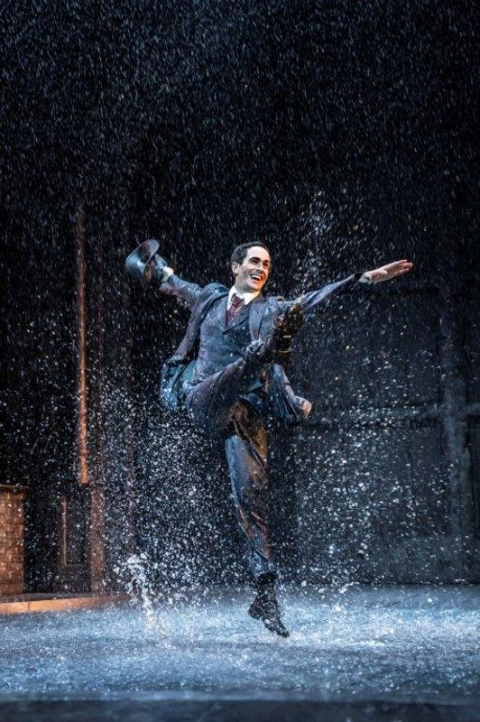 A man dancing in the rain