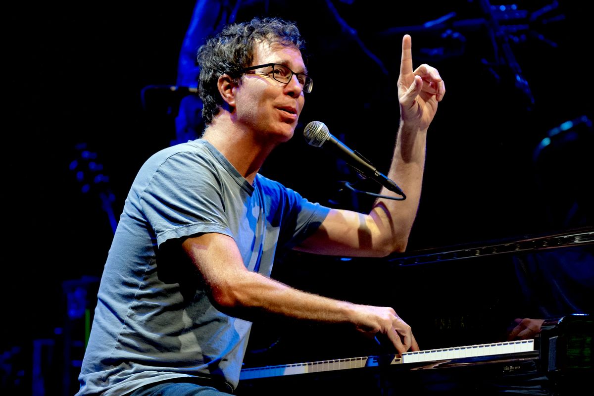 Ben Folds sat at a piano