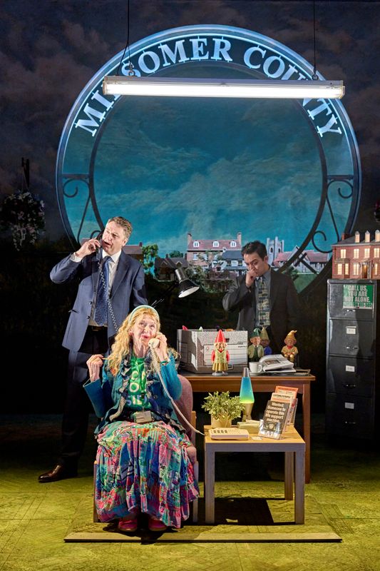 Three people look pensive on the phone.